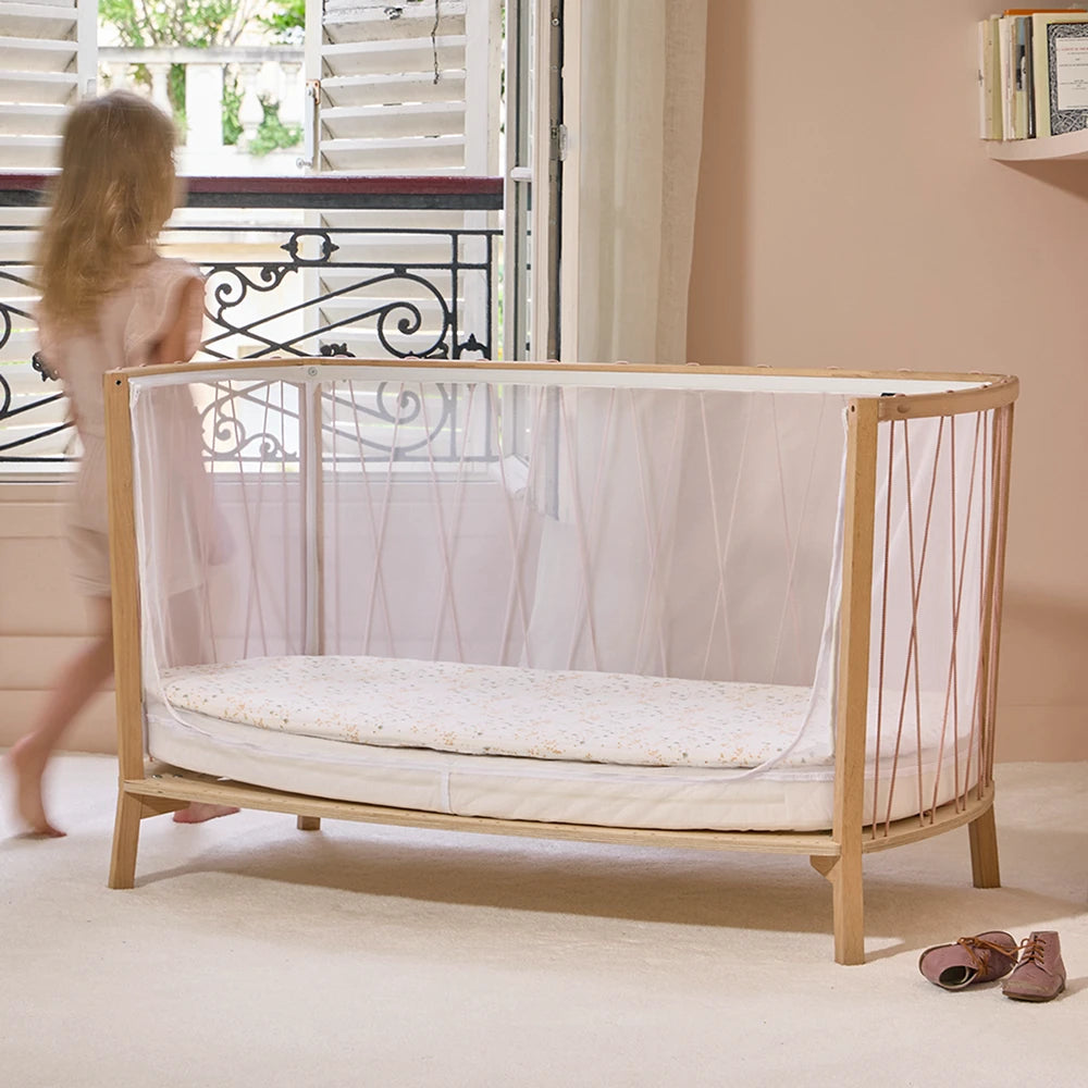 “Kimi” baby bed with mattress and CHARLIE CRANE mattress topper